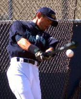 Ichiro practices batting during spring training
